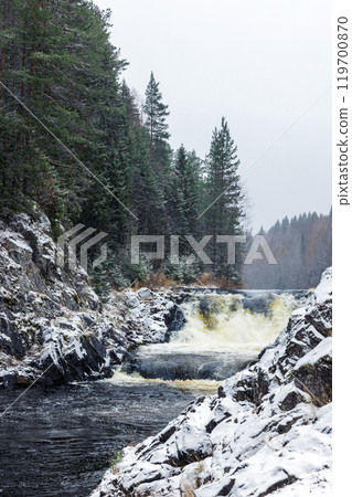 Kivach Falls, vertical landscape photography taken on a winter day Kivach Falls, vertical landscape photography taken on a winter day 119700870