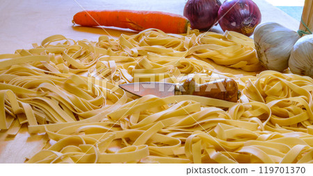 Fettuccini or Tagliatelle Fettuccini or Tagliatelle 119701370