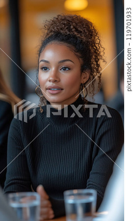 Overhead Shot of Female Candidate in a Meeting 119701933