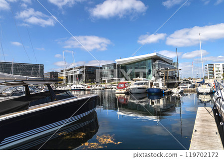 Yacht parking. A marina lot. Yacht and sailboat is moored at the quay. 119702172
