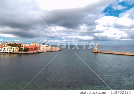 Landmarks of Crete - Panorama View of venetian port of Chania and lighthouse in old harbour of Chania, Greece. Landmarks of Crete - Panorama View of venetian port of Chania and lighthouse in old harbour of Chania, Greece. 119702183