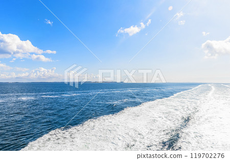 Water trail behind cruise ship. Water trail behind cruise ship. 119702276
