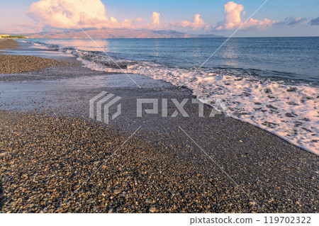 Sea shore. Beautiful empty beach in summer sunny day on Crete island in Greece. 119702322