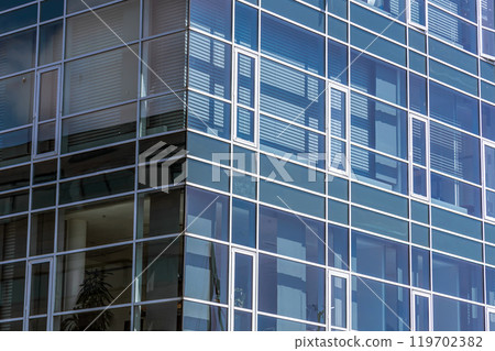 Modern glass office building in an expensive area of Copenhagen, Denmark. 119702382