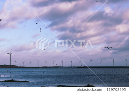 Wind turbine farm power genarator in beautiful nature landscape for production of renewable green energy. Wind turbine farm power genarator in beautiful nature landscape for production of renewable green energy. 119702395