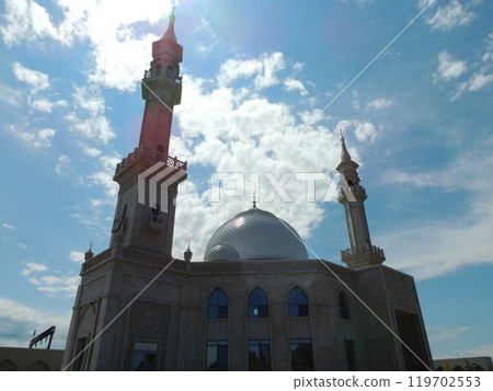 beautiful mosque in russia, islamic architecture, silhouette of muslim temple against blue sky with clouds, religious asian landscape beautiful mosque in russia, islamic architecture, silhouette of muslim temple against blue sky with clouds, religious asian landscape 119702553