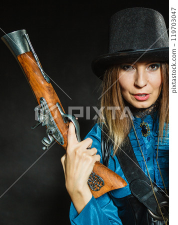 Steampunk with old retro camera and pistol. 119703047