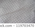 Recycled perforated white paper close up texture 119703470