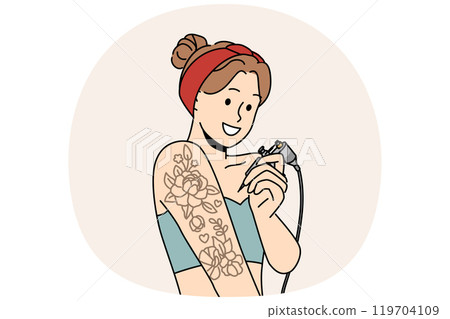 Woman tattoos hand on own and smiles, offering to use services of professional tattoo artist Woman tattoos hand on own and smiles, offering to use services of professional tattoo artist 119704109