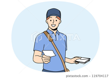 Guy works as postman and with smile holds envelope with letter and delivery correspondence 119704117