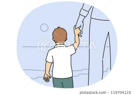 Little boy holds father hand and look at sea, enjoy walk together during sunset, view from back 119704128