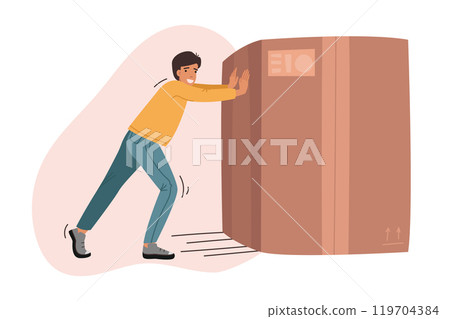 Man pushes heavy box and smiles while moving to new apartment or delivering order Man pushes heavy box and smiles while moving to new apartment or delivering order 119704384