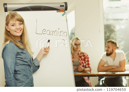 Student girl writting Learning word on whiteboard 119704650