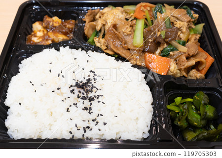 Delicious Chinese bento, fried pork and vegetable bento Delicious Chinese bento, fried pork and vegetable bento 119705303