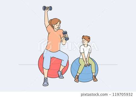 Mom and daughter do fitness sitting on fitballs and lifting dumbbells to improve health 119705932