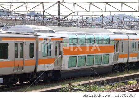 A large number of Chuo Line double-decker green cars stored at the Toyota Rolling Stock Center (Hino City, Tokyo) 119706397