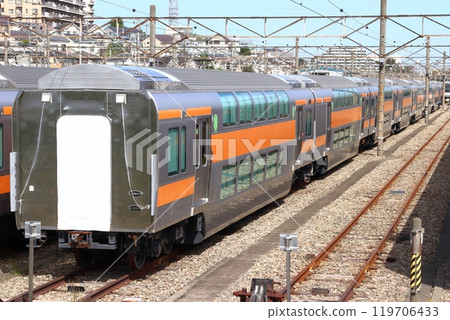 A large number of Chuo Line double-decker green cars stored at the Toyota Rolling Stock Center (Hino City, Tokyo) 119706433