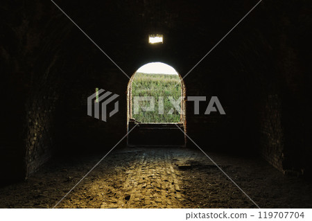 A window in the Bobruisk fortress. Evening sunlight inside the fortress A window in the Bobruisk fortress. Evening sunlight inside the fortress 119707704