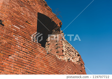 The dilapidated walls of the Bobruisk fortress made of red brick 119707722