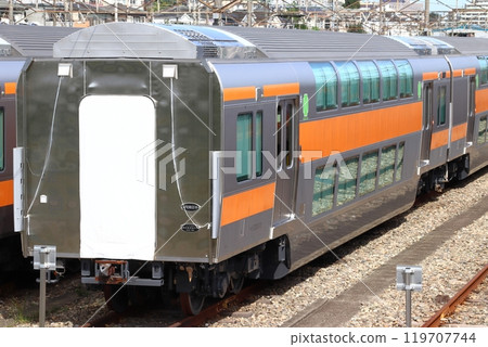 A large number of Chuo Line double-decker green cars stored at the Toyota Rolling Stock Center (Hino City, Tokyo) A large number of Chuo Line double-decker green cars stored at the Toyota Rolling Stock Center (Hino City, Tokyo) 119707744