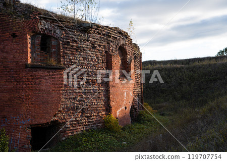 The dilapidated walls of the Bobruisk fortress made of red brick 119707754
