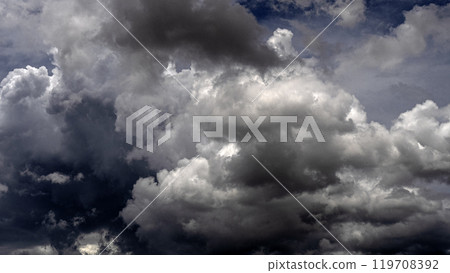 Dramatic dark storm rain clouds black sky background. Dark thunderstorm clouds rainny atmosphere. Meteorology danger windstorm disasters climate. Dark cloudscape storm disaster gloomy gray cloud sky Dramatic dark storm rain clouds black sky background. Dark thunderstorm clouds rainny atmosphere. Meteorology danger windstorm disasters climate. Dark cloudscape storm disaster gloomy gray cloud sky 119708392