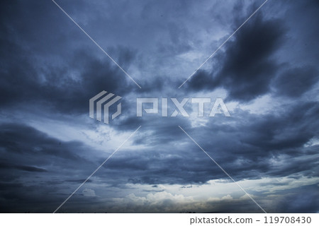 Dramatic dark storm rain clouds black sky background. Dark thunderstorm clouds rainny atmosphere. Meteorology danger windstorm disasters climate. Dark cloudscape storm disaster gloomy gray cloud sky 119708430