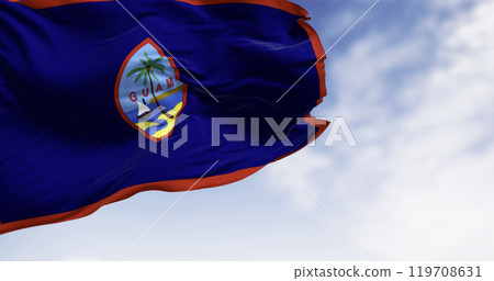 Guam national flag waving in the wind on a clear da Guam national flag waving in the wind on a clear da 119708631