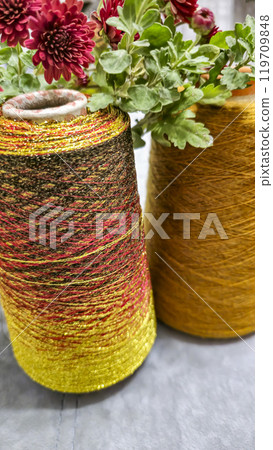 Orange threads for handicrafts. Selecting a color palette for knitting. Autumn 119709848