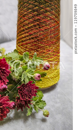 Orange threads for handicrafts. Selecting a color palette for knitting. Autumn 119709849