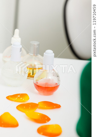 Small bottles with nail polish and oils 119710459