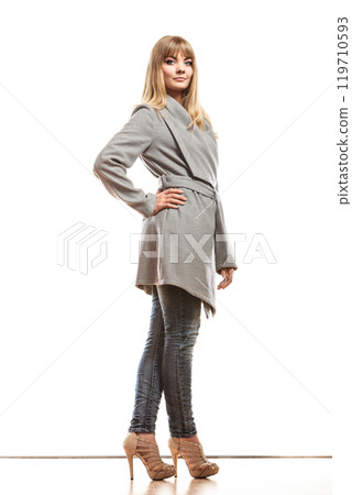 blonde elegant woman in gray coat. 119710593