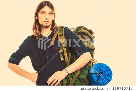 Man tourist backpacker portrait. Summer travel. 119710712