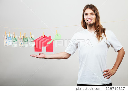 Man seller with money and house 119710817