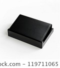 Black leather closed book on white background for study and writing purposes 119711065