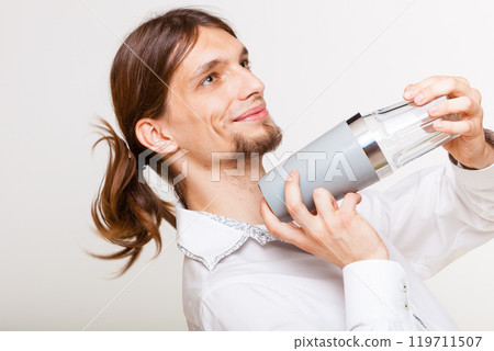 Long haired barman shaking head. 119711507
