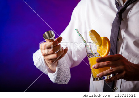 Young man bartender preparing alcohol cocktail drink 119711521