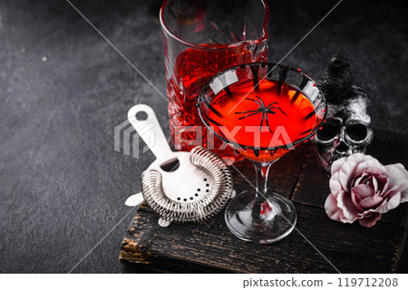 Spooky red Halloween monster cocktail 119712208