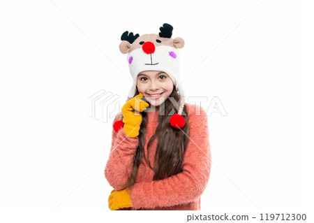 Girl kid wear warm hat isolated on white. Happy childhood. Teen girl in earflap hat. Winter fashion style. Girl in knitwear. Portrait of teen child wearing warm winter clothes. Warm mittens 119712300