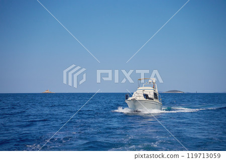 Luxurious motorboat in sea on summer day Luxurious motorboat in sea on summer day 119713059