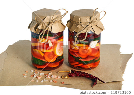 two jars with salted fermented vegetables isolated on white background 119713100