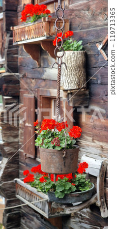 Most beautiful Swiss villages - pretty Griementz with traditional wooden houses and floral streets. popular tourist attraction in Valais Canton of Switzerland Most beautiful Swiss villages - pretty Griementz with traditional wooden houses and floral streets. popular tourist attraction in Valais Canton of Switzerland 119713365