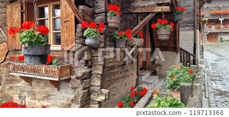 Most beautiful Swiss villages - pretty Griementz with traditional wooden houses and floral streets. popular tourist attraction in Valais Canton of Switzerland 119713368