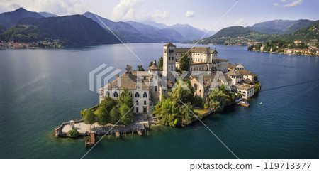 Most beautiful italian villages - unique romantic island San Giulio in Orta lake ( Lago di Orta) in Piedmont Province of Novara . aerial drone view 119713377