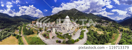 Piedmont, Italy .majestic Sanctuary of Madonna del Sangue, Sanctuary of Re - scenic village . famous places of worship. aerial drone panoramic view 119713379