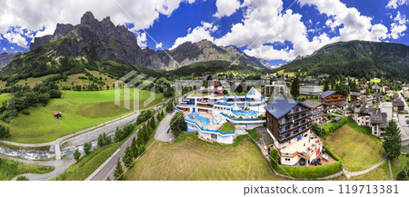Switzerland scenery and best tourist destination in Valais canton. Beautiful Leukerbad village and thermal resort, popular for summer and winter activities. high angle panoramic view of the town  119713381
