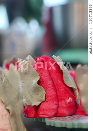 Marshmallow tulips. Marshmallow flowers. Spread out on the table surface. Close-up. 119713536