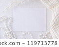 Blank Card with White Pearls and Cozy Knit Fabric for Minimalistic Winter Holiday or Event Design 119713778