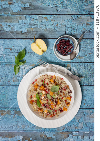 winter quinoa salad with roasted squash in a bowl winter quinoa salad with roasted squash in a bowl 119713976
