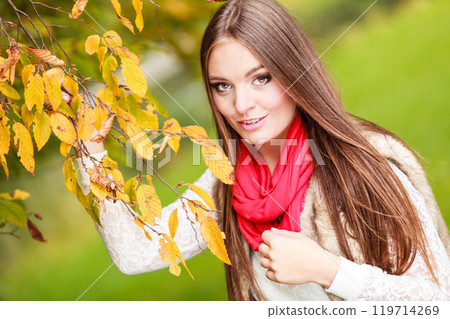 woman fashion girl relaxing walking in autumnal park 119714269